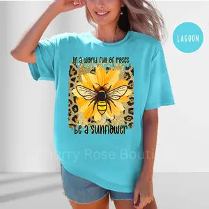 In a world full on roses, be a sunflower, Sunflower, Bee, Women's Shirt, Comfort Color Shirt Cotton Fabric Womenswear Graphic Top