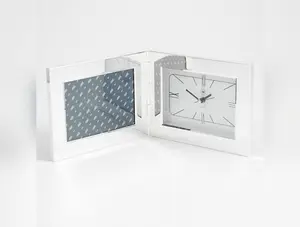 Silver Plated Alarm Clock and 3 1/2"x5" Picture Frame.
