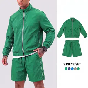 Men’s retro athletic two-piece set featuring contrasting piping: long-sleeve zip-up top and casual shorts with an elastic waistband and slanted pockets. Versatile men’s outfit suitable for jogging, tennis, club events, and everyday casual wear—an essentia