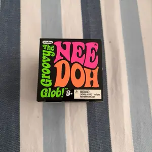 Orange groovy glob squishy tou