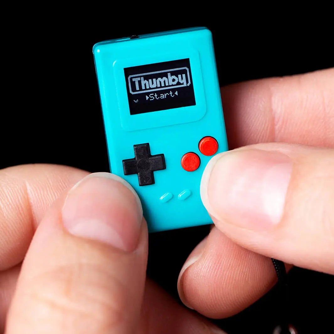 TINYCIRCUITS Thumby - Retro Handheld Game Console - Charging via USB-C Cable - Tiniest Handheld Console