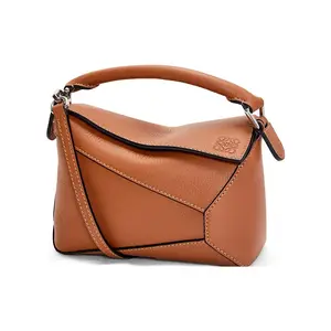 LOEWE Puzzle Mini Leather Crossbody Bag with Adjustable Strap for Women in Tan