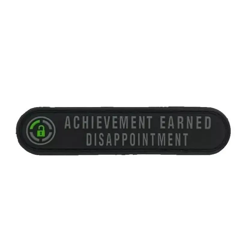 Achievement Earned Dissapointment Humor Tactical Patch (PVC Rubber - Hook Fastener Backing - 3.5 X 0.75 -wy8) for Backpacks, Range Bags, Clothes, Hats, and More