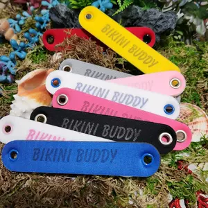 Bikini Buddy neck pad for halter neck strap pain. Stops straos from digging in.