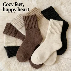 Women's fleece-lined and thickened warm socks, solid color mid-calf socks, casual and simple style, versatile everyday socks for women.