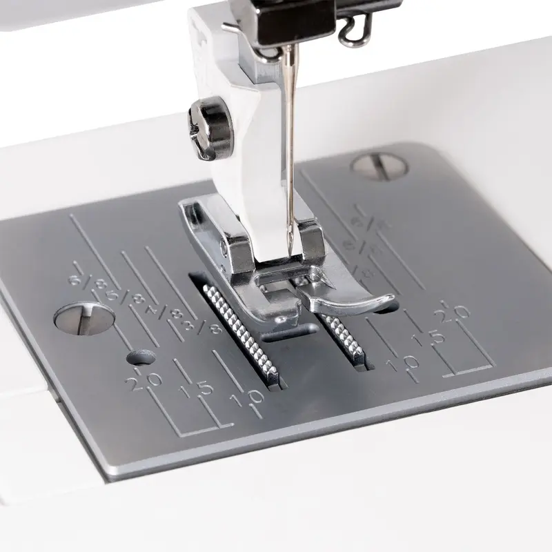 Presser foot, needle and marked needle plate