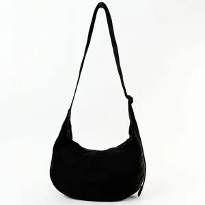 BAGGU Medium Nylon Crescent Bag | Trendy Premium Crossbody with Adjustable Strap & Zipper Pockets, Eco-Friendly Machine Washable Travel Purse - 13.75 x4"x8"