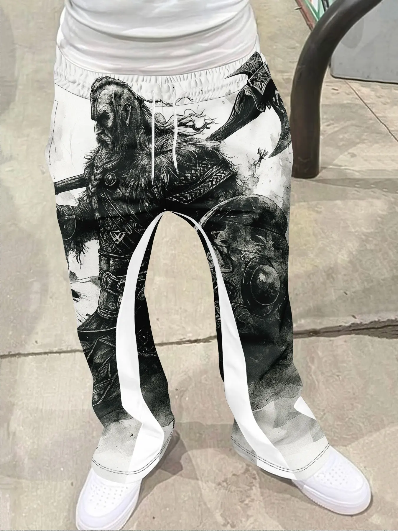 Viking Warrior themed black and white printed Geometric Fitted casual pants, featuring a Viking warrior with a battle axe and armor, with shields and Nordic decorations, restoring Viking culture's rough texture