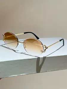 New Luxury Frameless Oval Sunglasses, Metal Temple Design, Trendy Minimalist Style, High-End Fashion Accessory, Versatile Pair