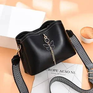 Small Crossbody Bag for Women - Lightweight Handbag with Butterfly Charm, Adjustable Straps, Versatile Design