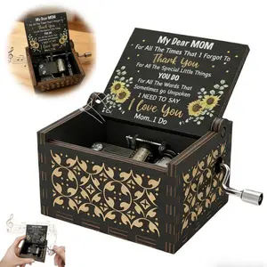 A sunflower music box gift, perfect for children to give to their beloved mother on birthdays, Christmas, and Mother's Day, expressing gratitude. Hand-cranked, carved wooden music box, black.