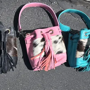 Women's Pink Cowhide Leather Bucket Bag with Adjustable Strap and Top Handle