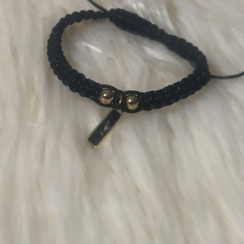 Minnelli Handmade Black Bracelet with Gold Accents - Crafted with Care