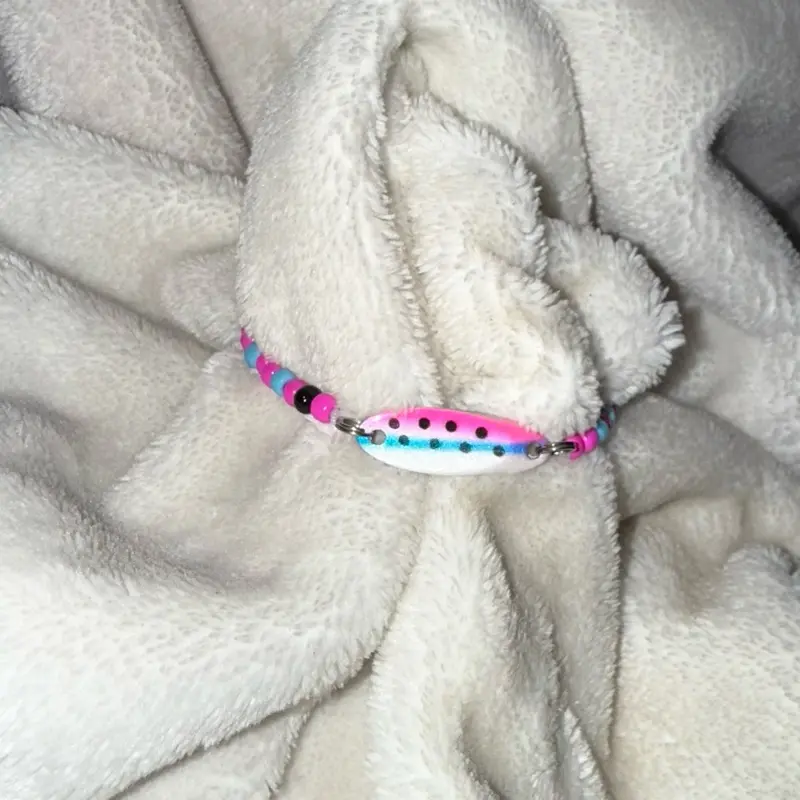 Fishing Lure Bracelets - Colorful Beaded Design on Soft Fabric Background