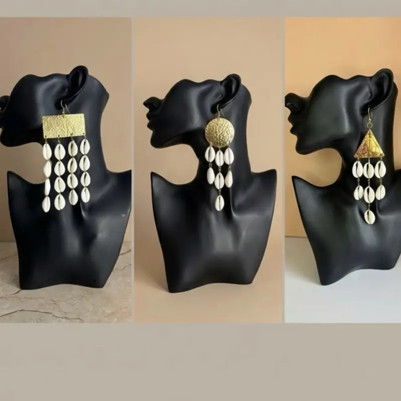 33/handmade natural cowries shell earrings with an accent of Gold brass material. Chose your favorite earrings below