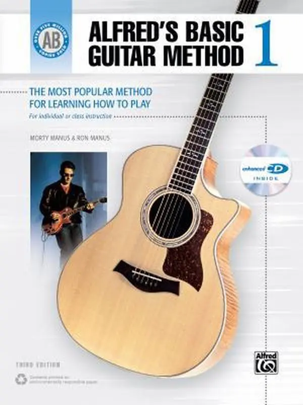 USED Book - Alfred's Basic Guitar Method, Bk 1: The Most Popular Method for Learning How to Play, Book & Enhanced CD (Alfred's Basic Guitar Library, Bk 1) by Morty Manus (Paperback) - english