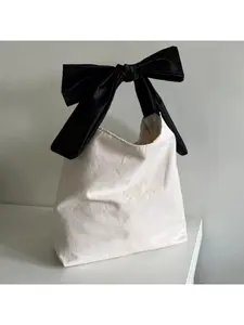 Korean version simple small 2025 spring new bow canvas bag large capacity shopping bag shoulder bag