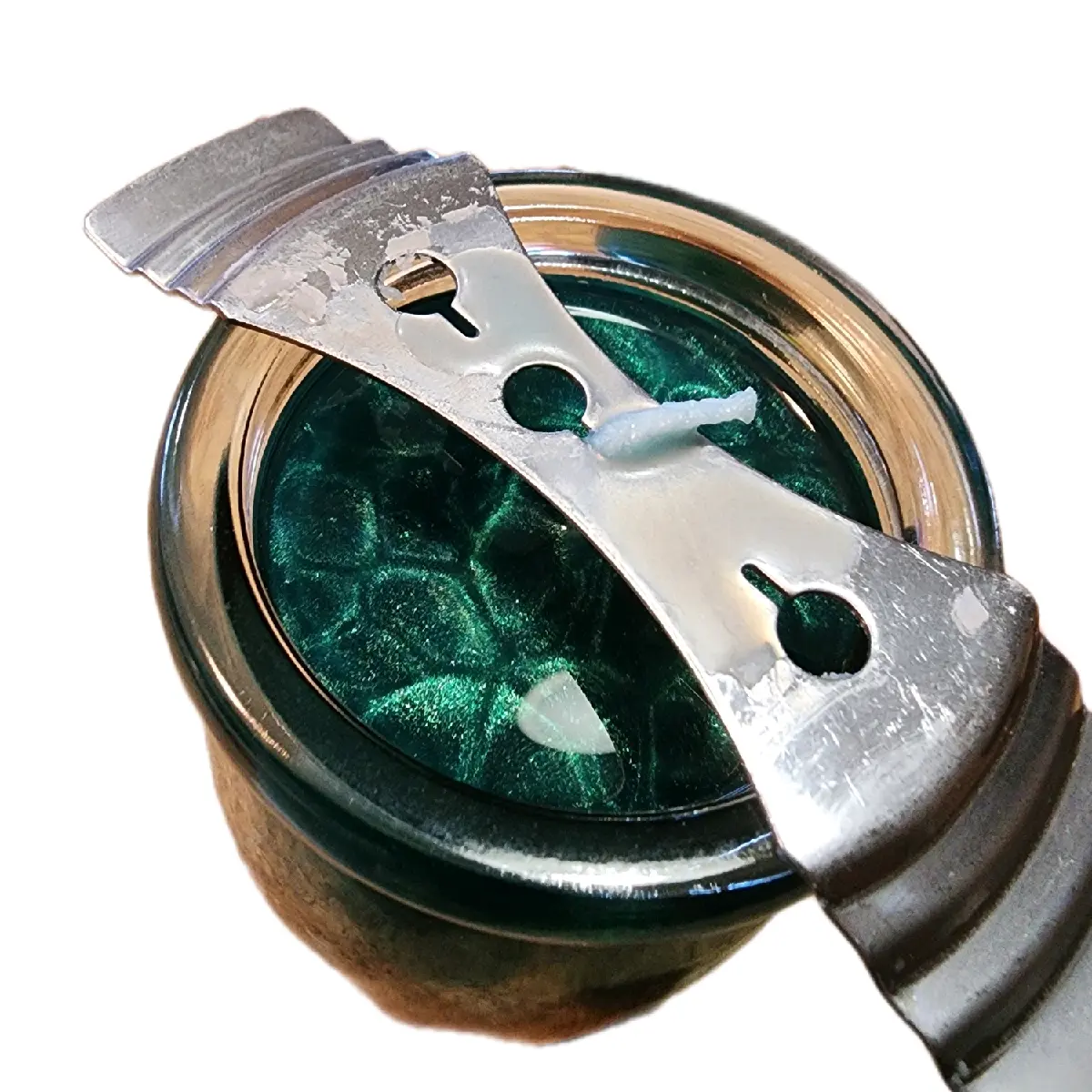 Shimmering metallic candle