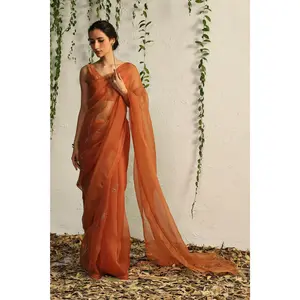 Orange organza nakshi saree with blouse