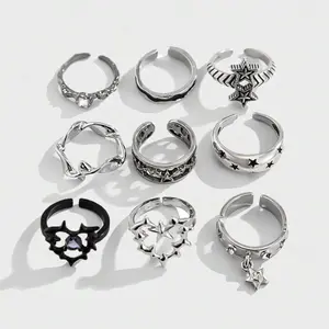 Silver-Tone 9pcs Goth Punk Ring Set – Y2K Hollow Star Heart Stackable Rings, Casual Statement Jewelry for Women