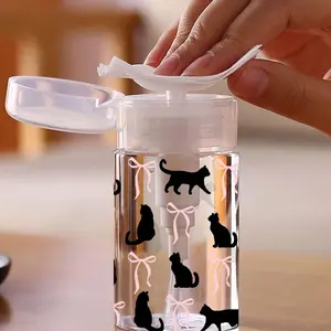 Pink bow-patterned transparent PET reusable travel dispensing bottles, makeup remover dispensers, with 3.38 oz/6.76 oz portable pump, suitable for nail polish remover, toner, and makeup remover.  Features a dome design, hand wash only, and is reusable.