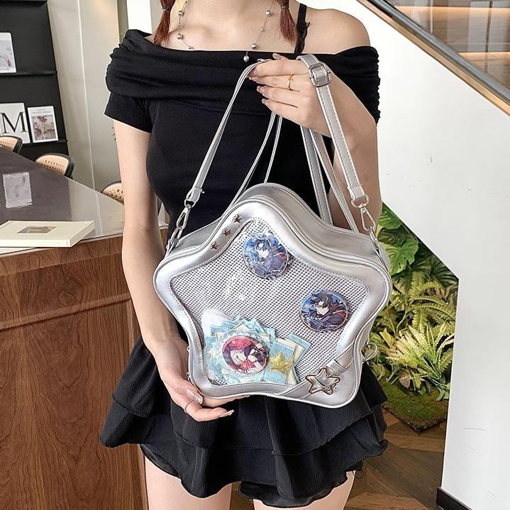 RIVERICH 3-Way Convertible Star-Shaped Ita Bag for Anime & K-Pop Fans, Multi-Strap Acrylic Display Backpack with Removable Shoulder Straps. This unique pentagram bag features a clear window to showcase your pins, charms, and collectibles