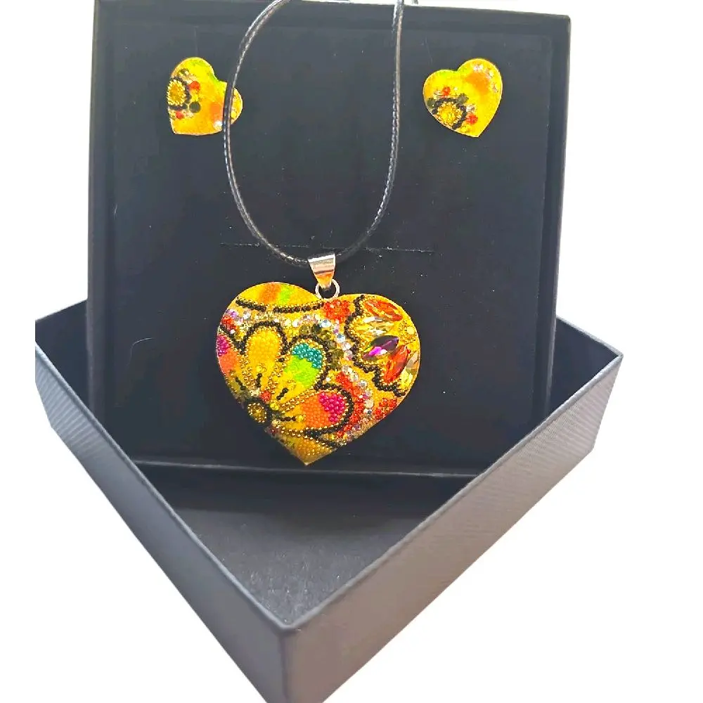 Rubylishious  Silver set of earrings and pendant yellow heart shape multicolor pendant  .925 silver  Made in Mexico  Comes with a Sterling Silver Satin Rat Tail Cord 2oz