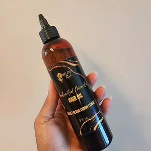 Melanated Miracle Hair Oil to help on your growth journey for thin hair. treatment