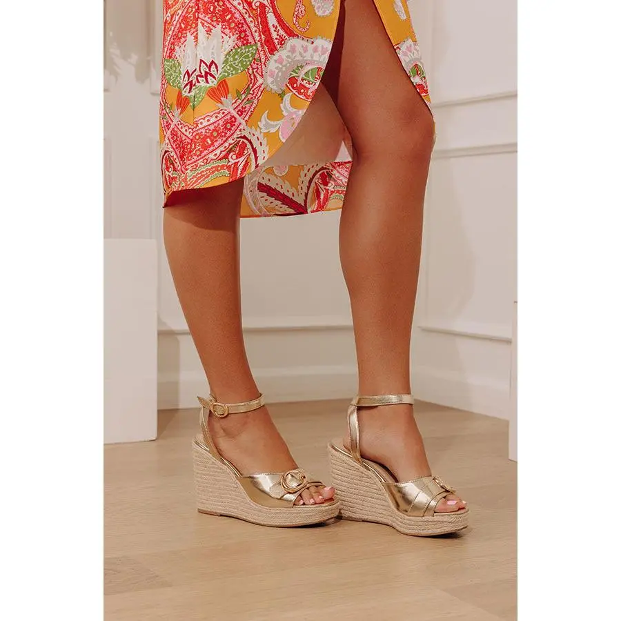 The Clara Faux Leather Metallic Espadrille Wedge in Gold
