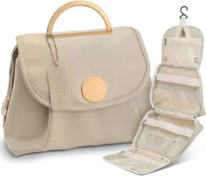 Chandelli - Hanging Travel Toiletry Bag - Fits 40 Toiletries - Portable Travel Bag with Hook - Convenient, Water Resistant Makeup, Cosmetics & Toiletry Bag for Women (Cream)