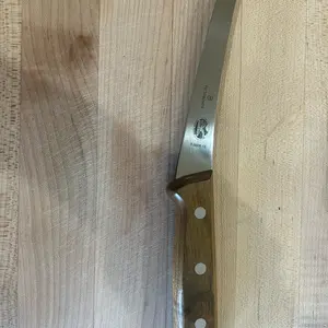 6” curved boning knife, extremely sharp with rosewood handle. Perfect for butchery, meat cutting, grilling and everyday use