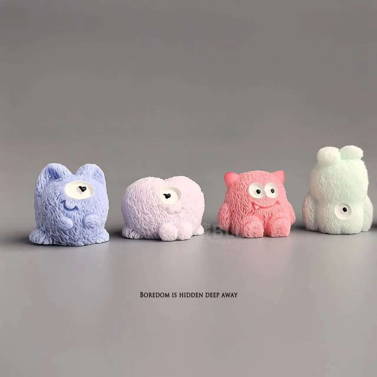 Fuzzy Texture Mini Monster Resin Figurines with pastel candy colors, solid drop-resistant resin, cute cartoon face design for desk & car interior decor