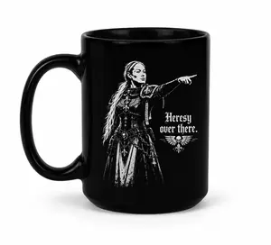 Warhammer 40K Sophie Cunningham Adepta Sororitas 'Heresy Over There' Funny Coffee Mug - Sisters of Battle Imperial Aquila Black Ceramic Tea Cup - Perfect Gag Gift for Tabletop Wargamers and Imperium Loyalists