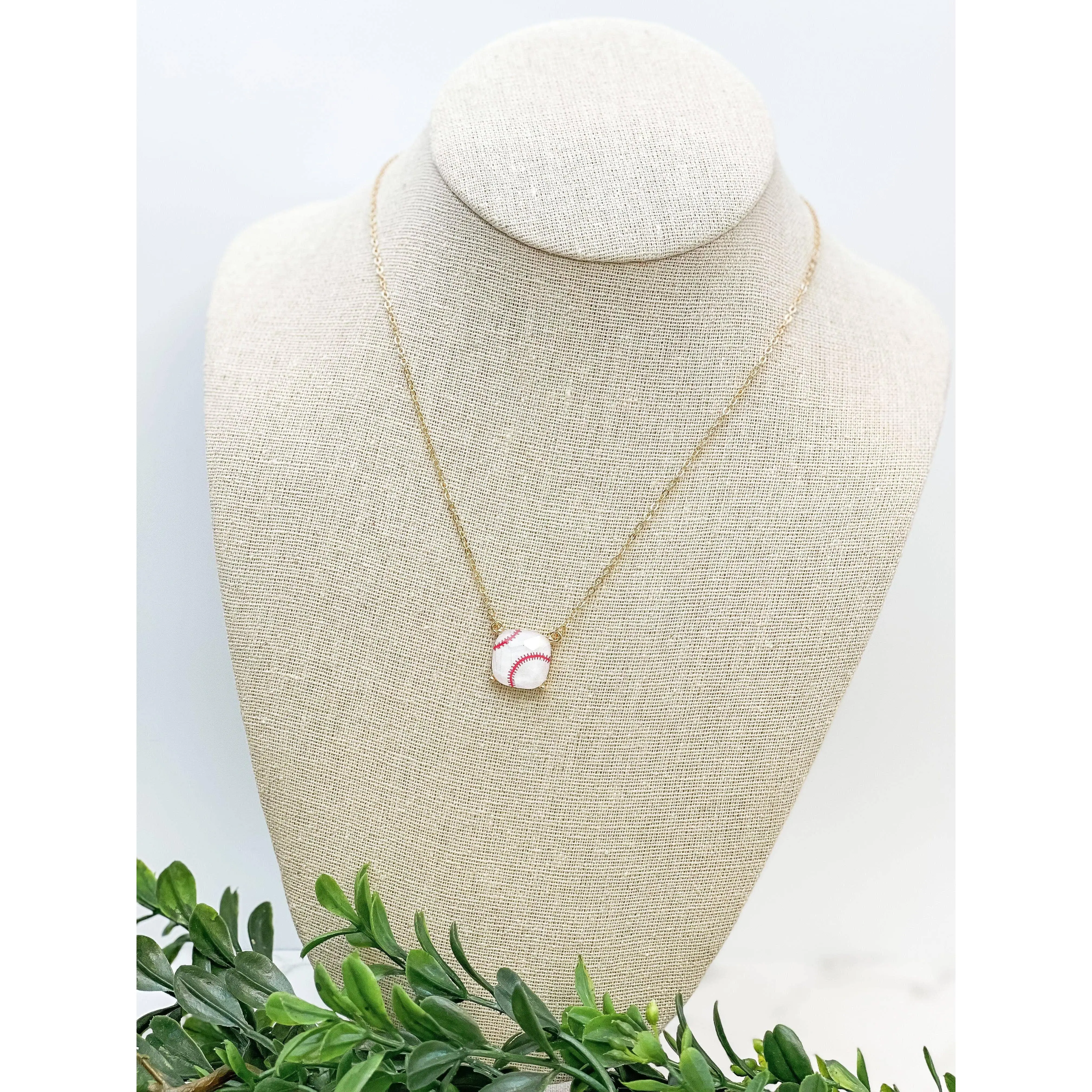 Baseball pendant, cushion cut on gold chain necklace