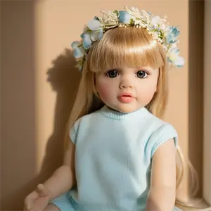 Betty 22-inch Realistic Reborn Girl Doll Full Vinyl Body Blonde Wig Sparkling Blue Eyes Sky Blue Knit Dress Poseable Water-Friendly Design Doll Set with Doll Outfit