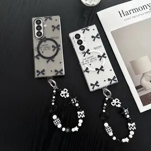 Glossy transparent bow pattern magnetic phone case, supports wireless charging, comes with a bracelet, hard PC back panel protects the phone case, suitable for Samsung Galaxy Galaxy Z Fold 7 Z Fold 6 Z Fold 5 Smartphone