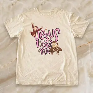 Curious George “Jesus Loves You “ T-Shirt Featuring two playful Curious George monkeys and the sweet message “Jesus Loves You”