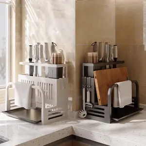 1 piece carbon steel multi-functional kitchen countertop storage rack with detachable water tray. Suitable for organizing and storing kitchen utensils and accessories, including knives, forks, spoons, pot lids, and cutting boards.