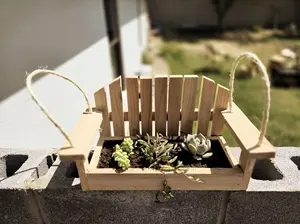 A Cute Mini Hanging Porch Swing Cedar Planter combines rustic charm with a playful twist—it's a tiny porch swing made of cedar wood.