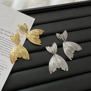 Mermaid Tail Glow EarringsOcean Whisper Tail EarringsOcean Siren Tail Earrings”  “Mermaid Glow Statement Earrings”