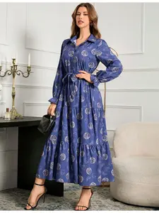 A women's blue-based floral print polo-collar long-sleeve tie bow waist-cinching slimming maxi dress, suitable for Casual Wear, commuting and vacation outfits.