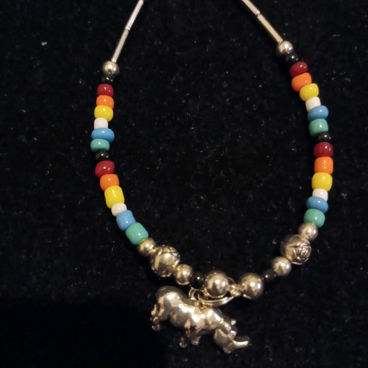 Southwestern Style Navajo Handmade Silver Rhino Charm Bracelet with Fire-Color Beads