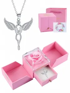Winged Diamond Radiance Fashion gem necklace with angel wings, paired with a surprise double-door preserved rose jewelry box. Perfect for birthdays, Mother’s Day and Valentine’s Day gifts.