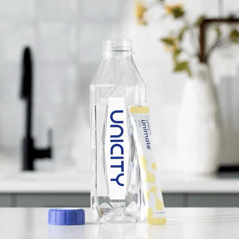 Unicity Diamond Bottle - Clear Plastic Water Bottle with Blue Cap for Daily Hydration Reusable Cup