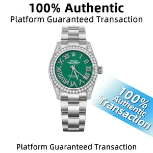 Rolex 114200 with aftermarket green dial, Roman numeral diamond hour markers, and diamond-set bezel WHP038185