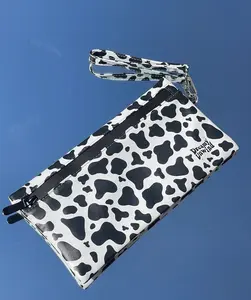 Cow Print Odor-Resistant Travel Pouch | Waterproof, Multi-Layer Storage Bag with Zipper & Wrist Strap Dreamy Unwind