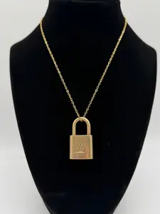 Pre-owned Louis Vuitton brass Bag Accessories Lock 340 on Necklace