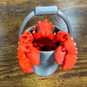 Articulate lobster figurine with bucket home decor