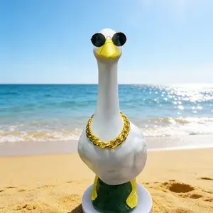 A cool and stylish porch goose outfit, sunglasses, and a gold necklace are suitable for outdoor patios and home décor.
