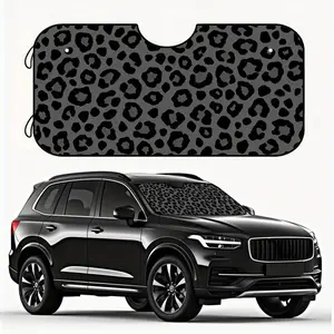 A foldable car sunshade with a leopard-patterned grey design, effectively blocking sunlight and heat. It is perfect for urban environments, parking lots, and holiday road trips.